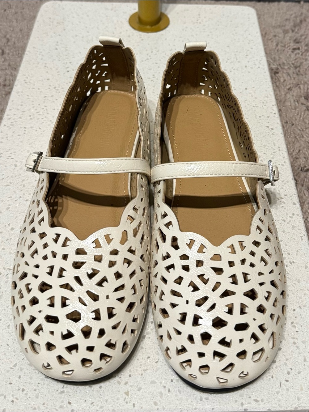 Women’s Cream Laser-Cut Mary Jane Flats with Adjustable Strap